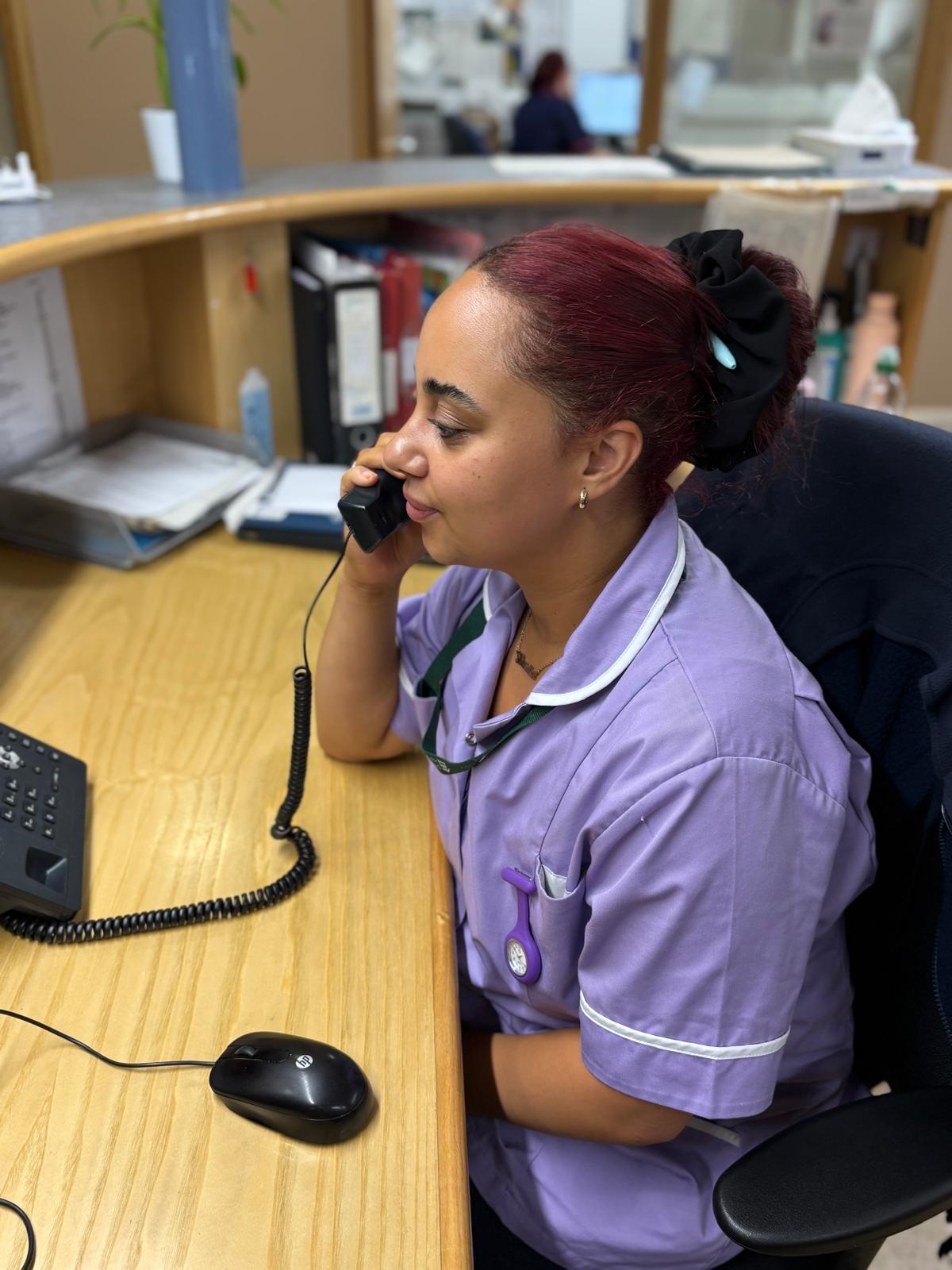 Nurse taking advice line call